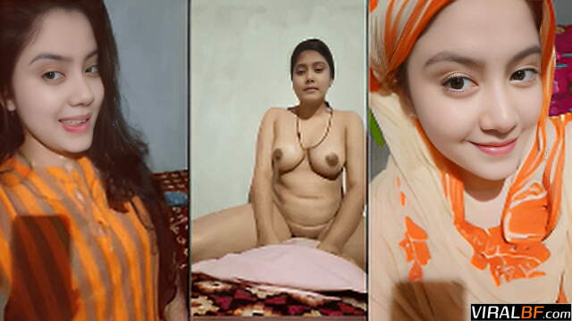 Young Indian girl performs a steamy strip show